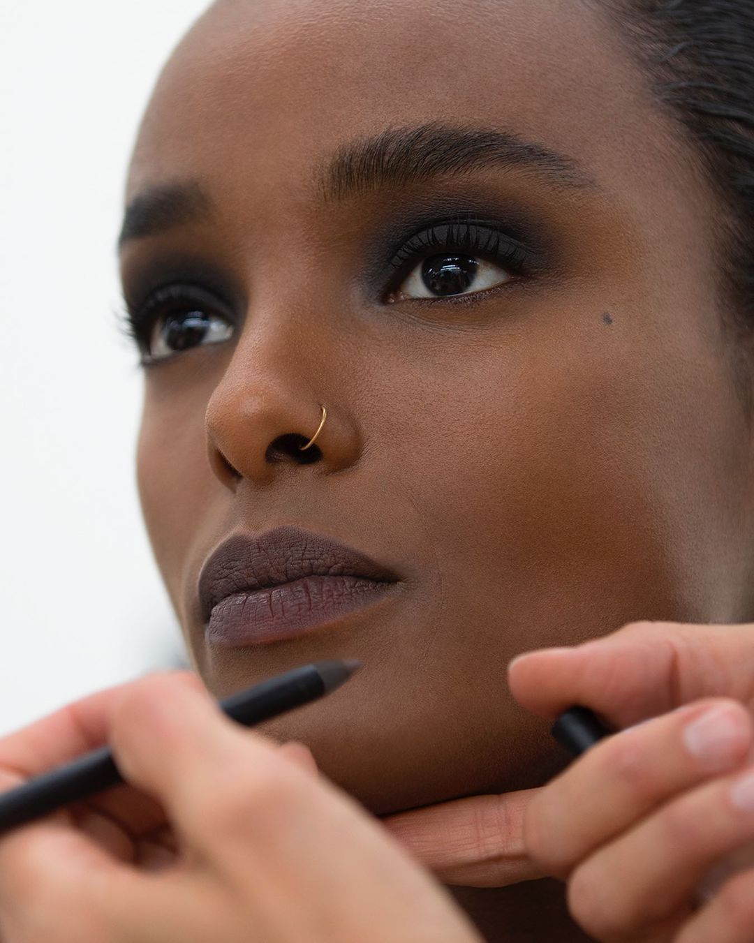 A Chanel model with a smokey eye makeup