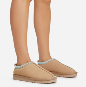 brown slippers with green trim